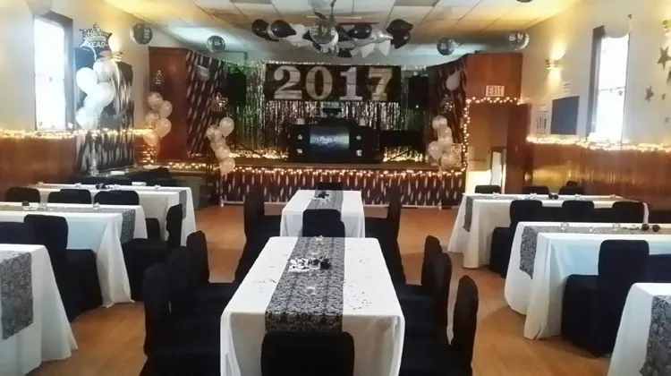 Interior of Gilford Community Hall main room with seating